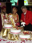 Asian Wedding Toastmaster at the cake cutting