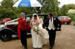 Richard Palmer Toastmaster with bride and father at Layer Marney Tower