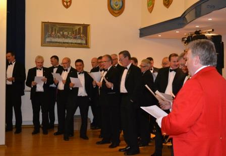 Toastmaster singing the Ladies Song as part of the chior