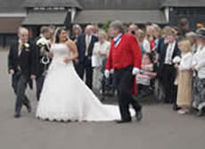 Wedding toastmaster Richard Palmer with bride and bridegroom at Channels Golf Club
